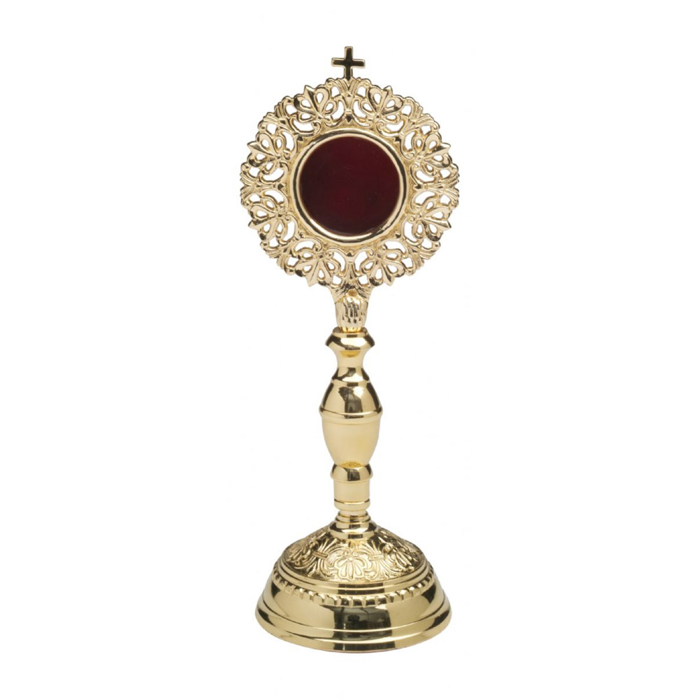 Relicario dorado con marco calado y base decorada