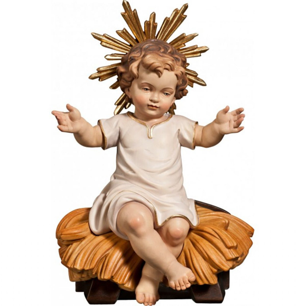 Nio Jess vestido sentado en cuna - Imagen en talla de madera de Val Gardena