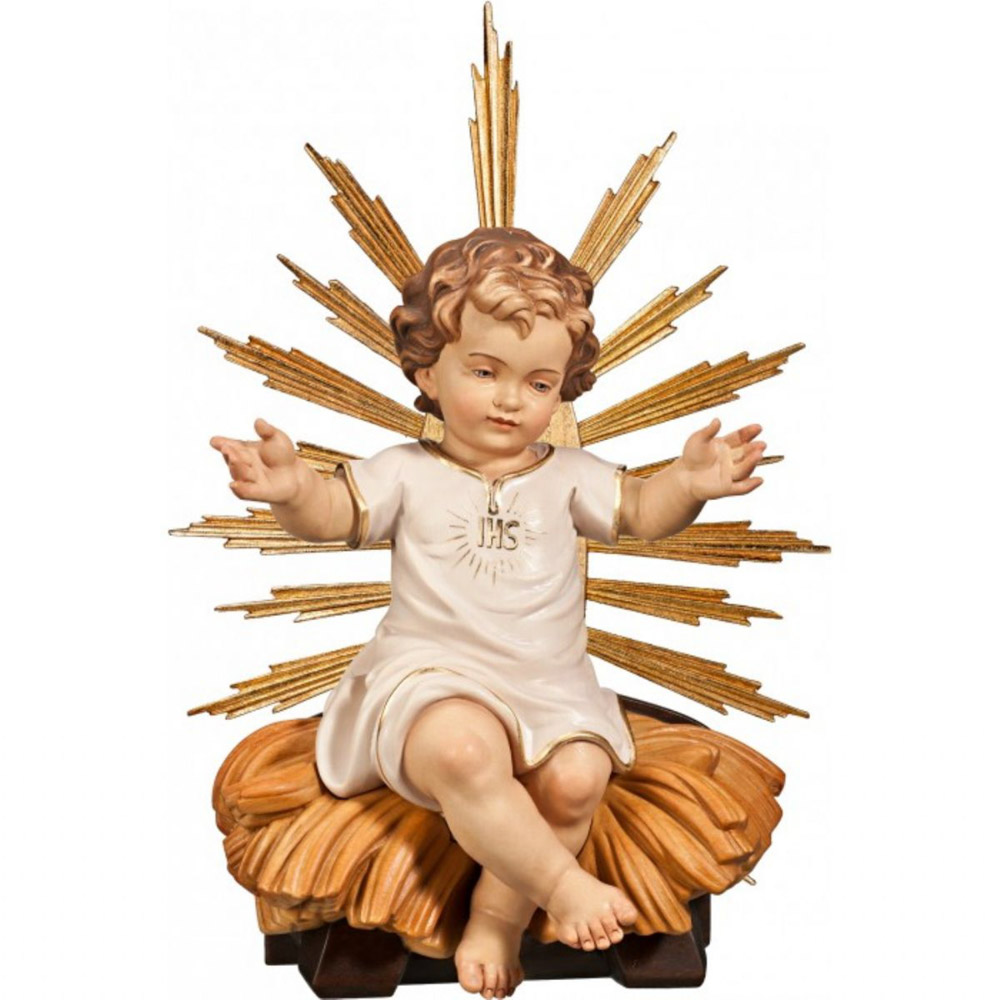 Nio Jess vestido IHS sentado en cuna con aureola - Imagen en talla de madera de Val Gardena