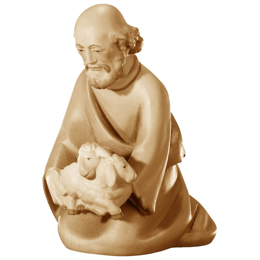 Pastor de rodillas con cordero