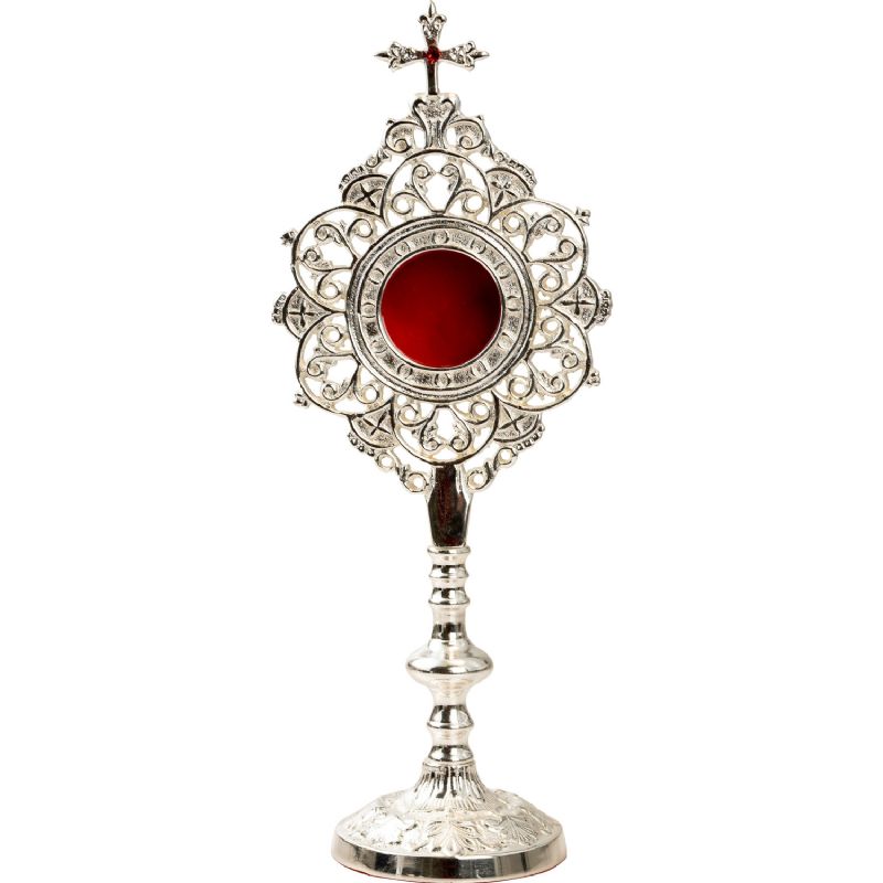 Relicario de mesa plateado con estructura calada y piedras